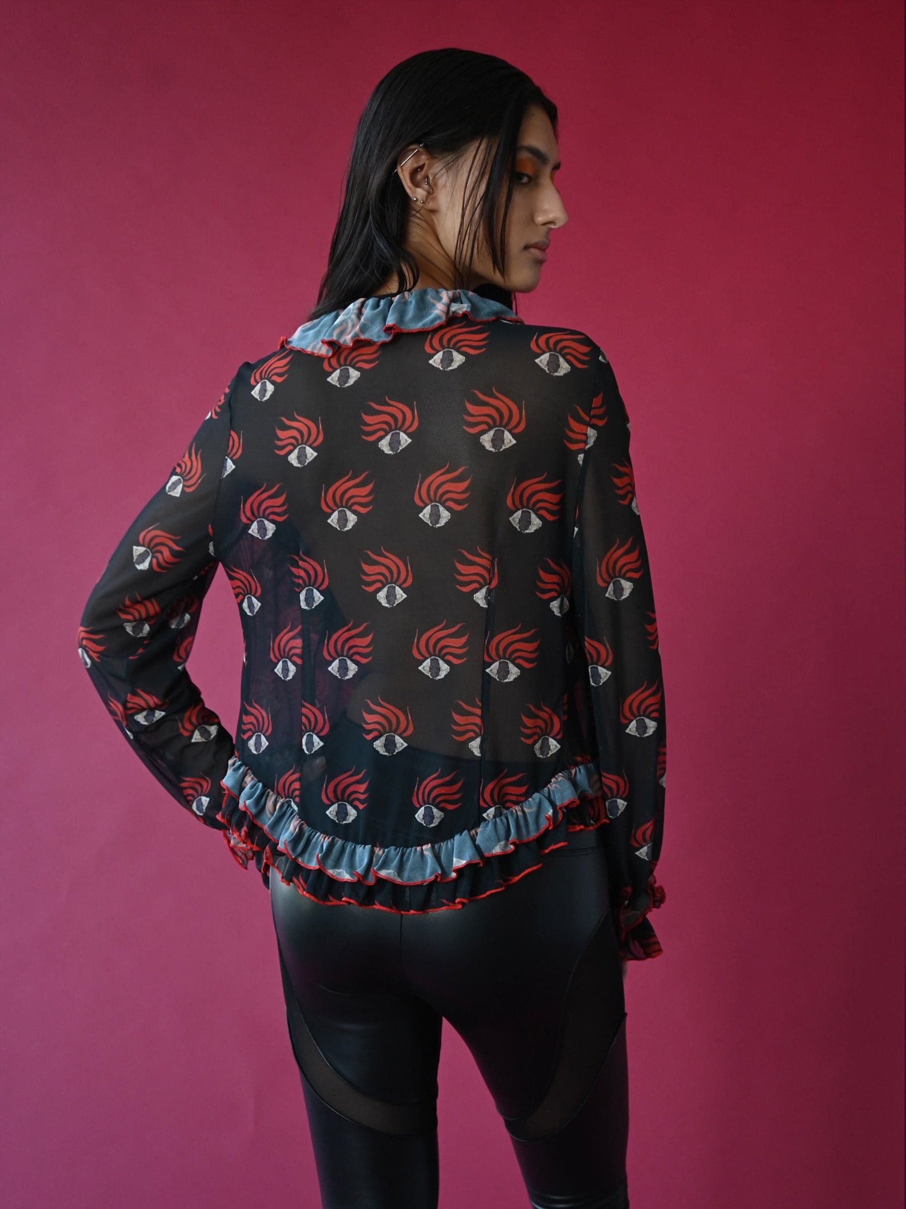 Ruffle eye print mesh top
