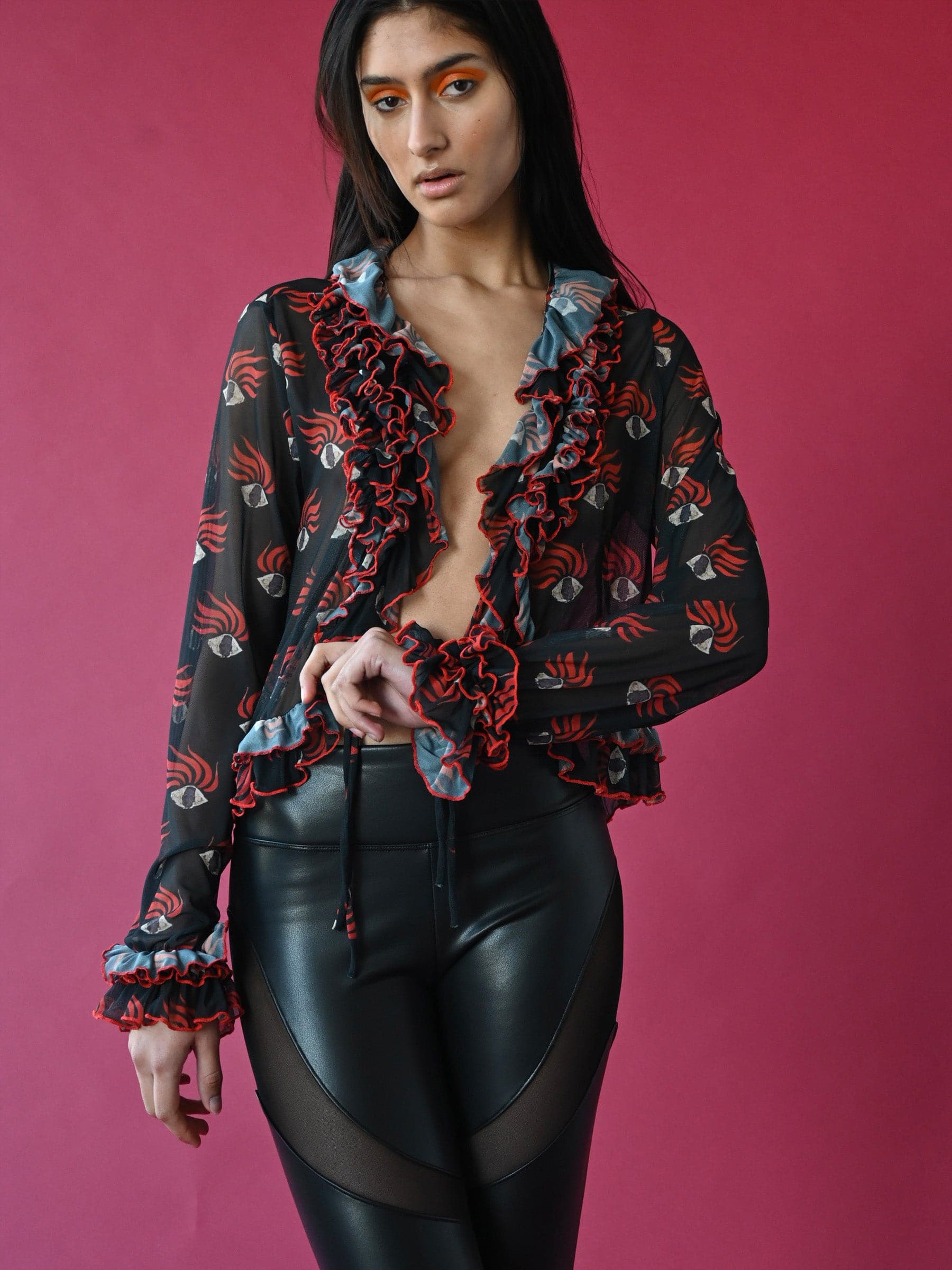 Ruffle eye print mesh top