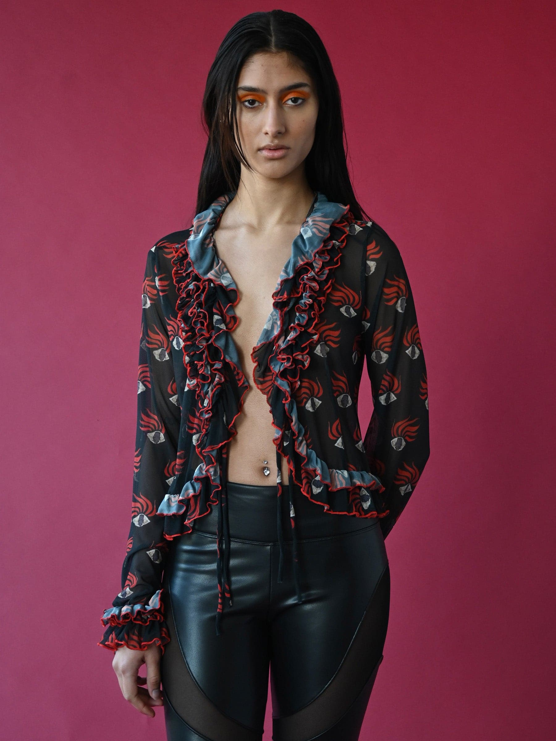 Ruffle eye print mesh top