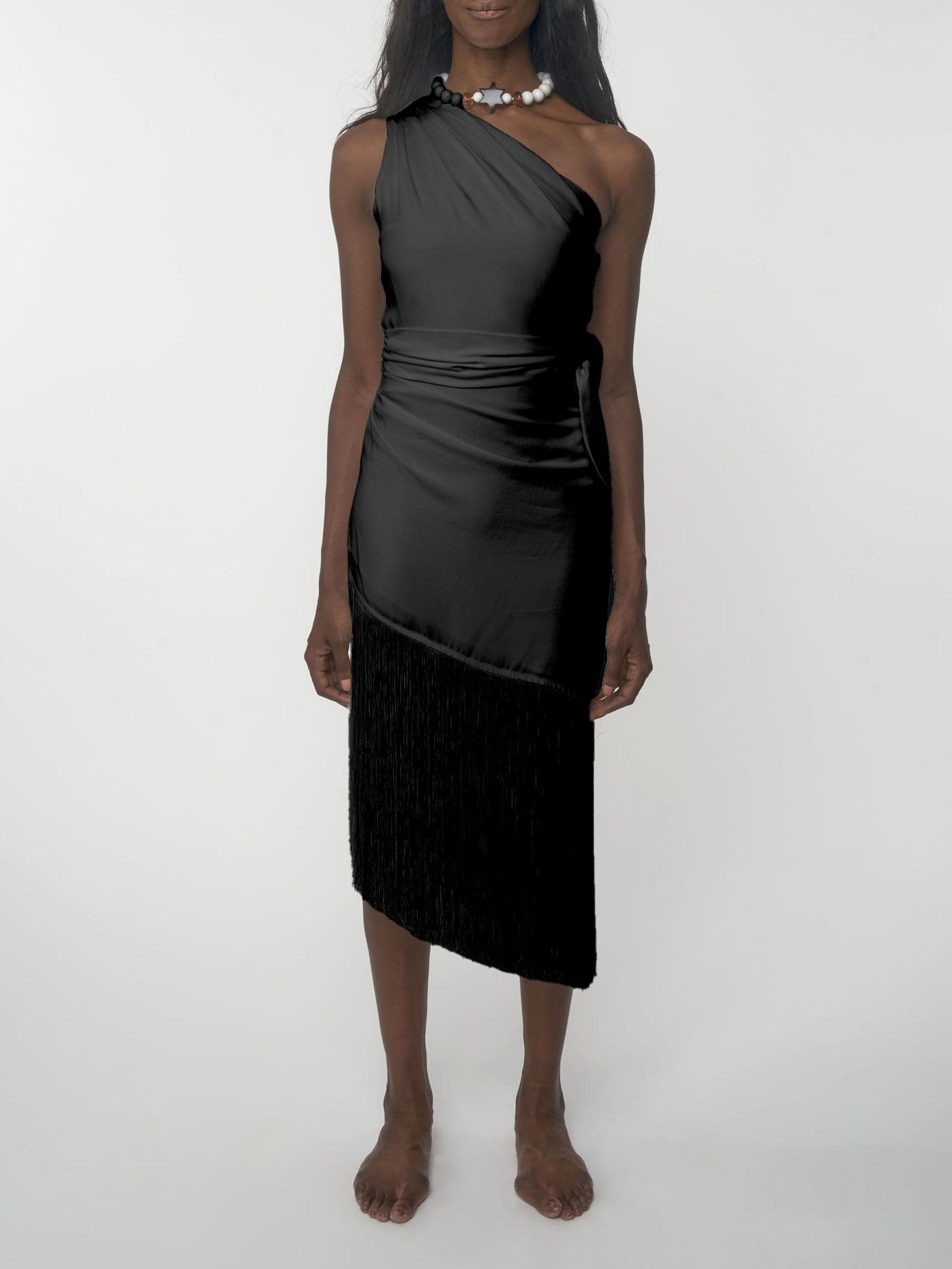 Black sustainable Tencel one shoulder dress with fringe