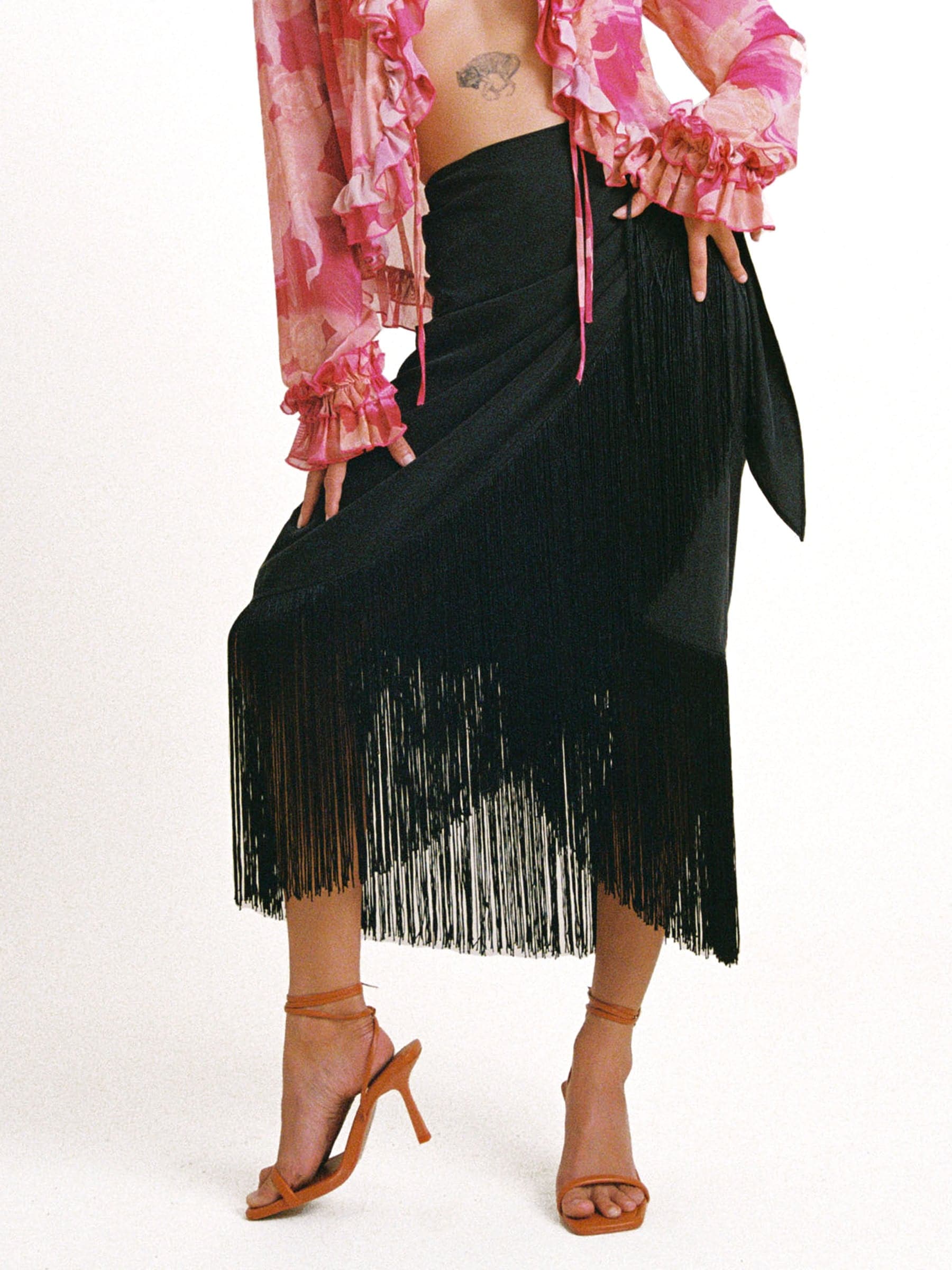 Black sustainable Tencel wrap skirt with fringe